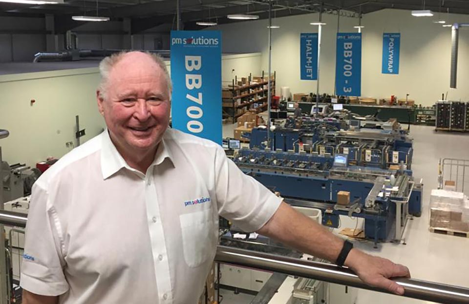 Ron Davidson overlooking the printing premises at PM Solutions
